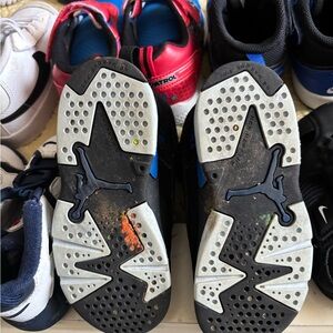 22 pairs of shoes. Includes snow boots, pool shoes and very gently used sneakers